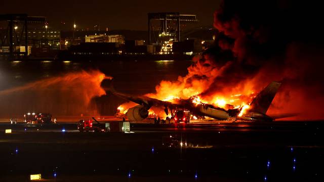 Japan Airlines' A350 airplane on fire at Haneda International Airport in Tokyo