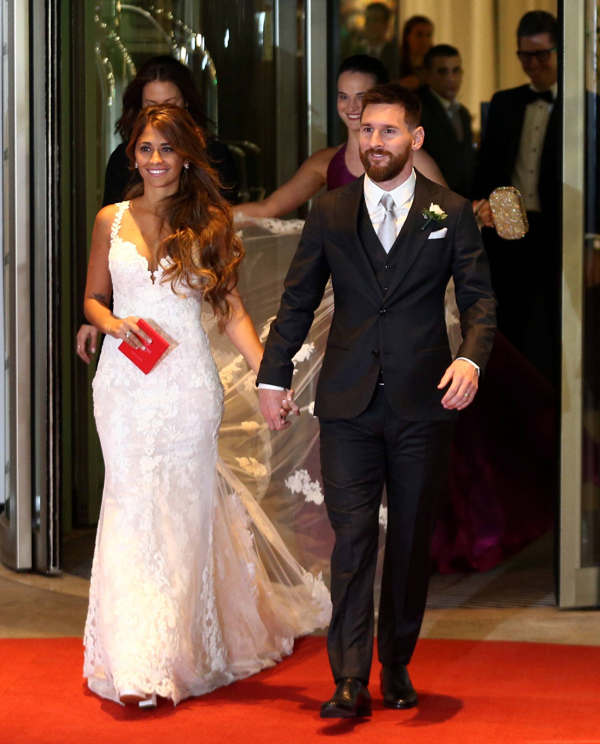 Argentine soccer player Lionel Messi and his wife Antonela Roccuzzo make an appearance for the press at their wedding in Rosario