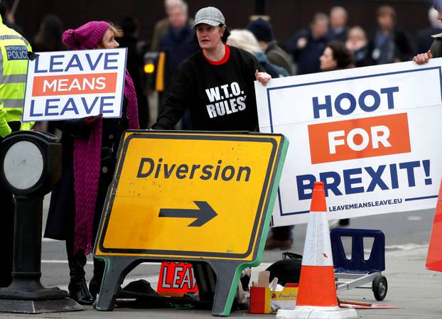 FILE PHOTO: Pro-Brexit protesters demonstrate outside the Houses of Parliament in London