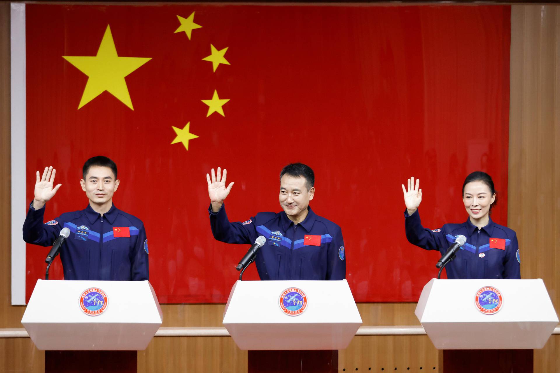 News conference before the launch of Long March-2F Y13 rocket, near Jiuquan