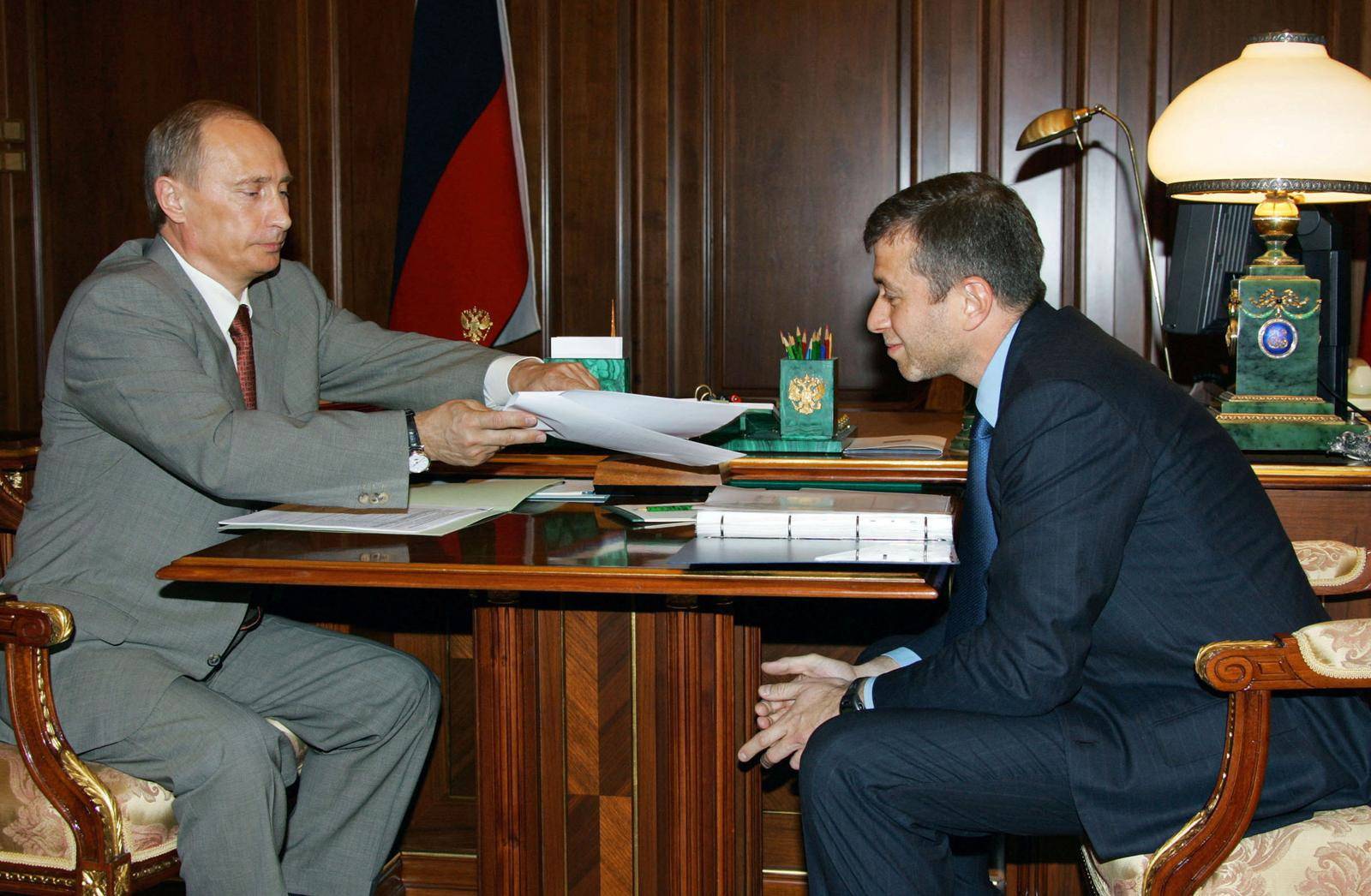 FILE PHOTO: Russian President Vladimir Putin meets with Chukotka region governor and owner of Chelsea soccer club Roman Abramovich in the Kremlin