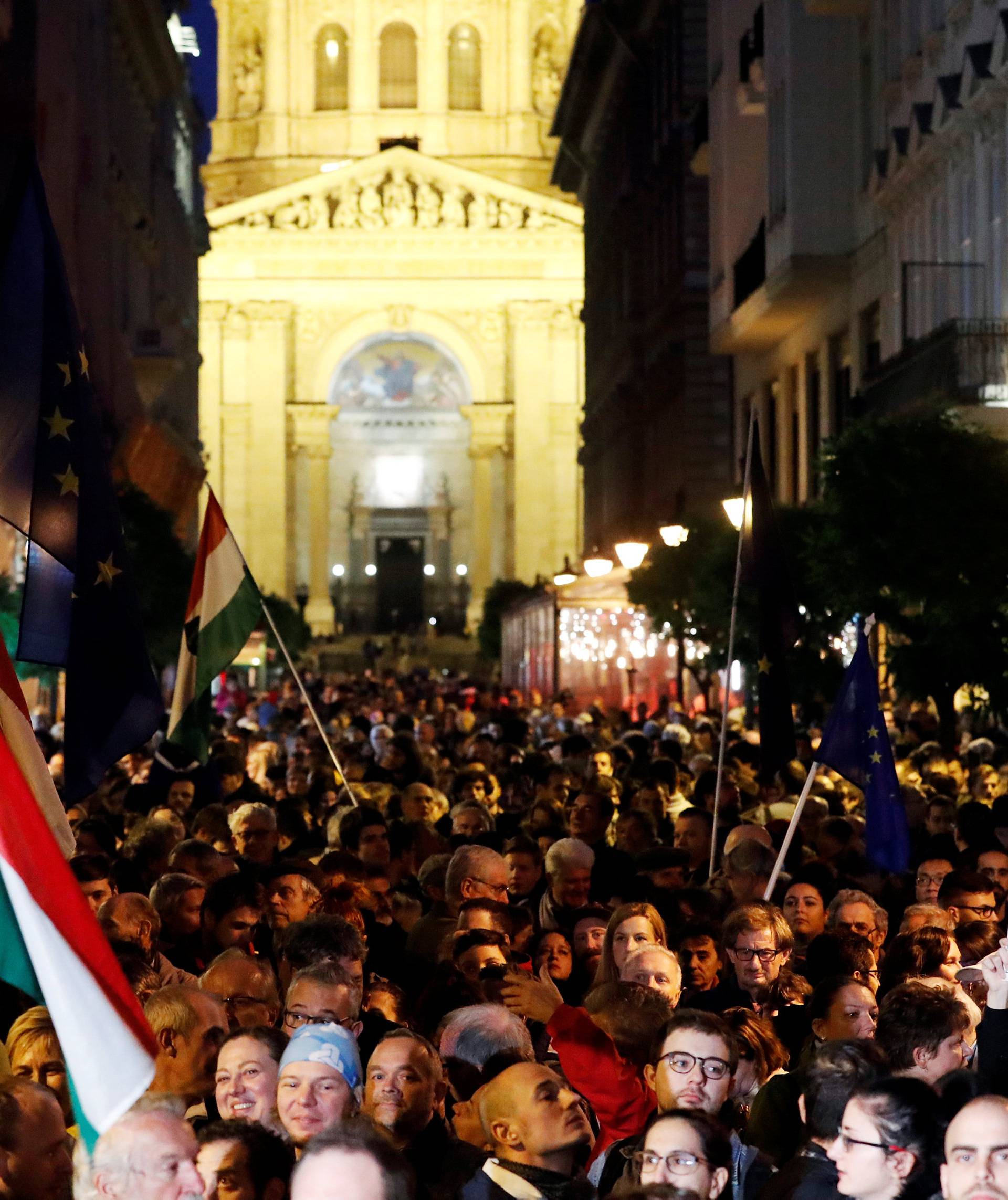 People attend a rally outside George Soros's Central European University to protest against the university being forced out of Budapest by Prime Minister Viktor Orban's government in Budapest