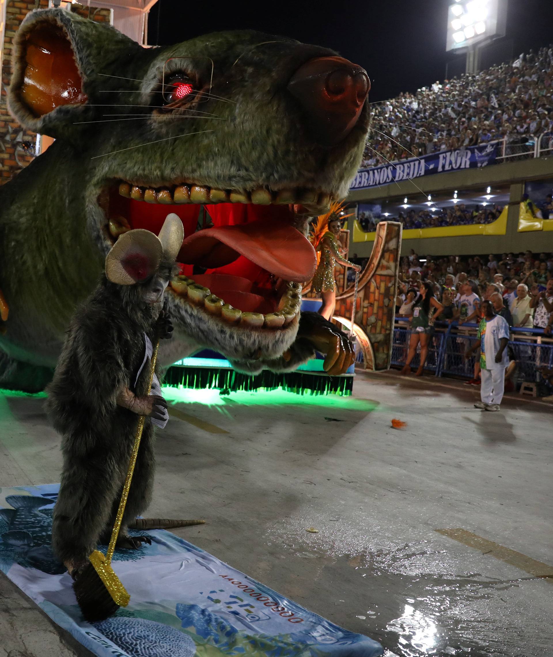 Revellers from Beija-Flor samba school perform during the second night of the Carnival parade at the Sambadrome in Rio de Janeiro