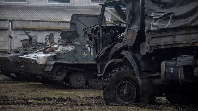 Russian military vehicles are seen in the north of Kharkiv region