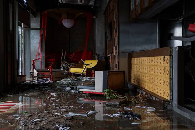 A damaged restaurant stands in the aftermath of Super Typhoon Ragasa in Hong Kong