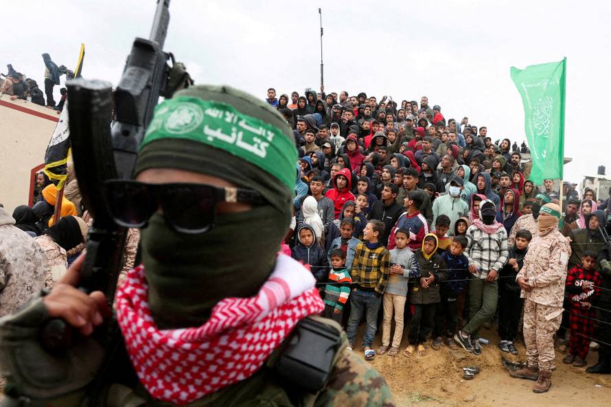 FILE PHOTO: Hamas hands over bodies of deceased hostages, in Khan Younis