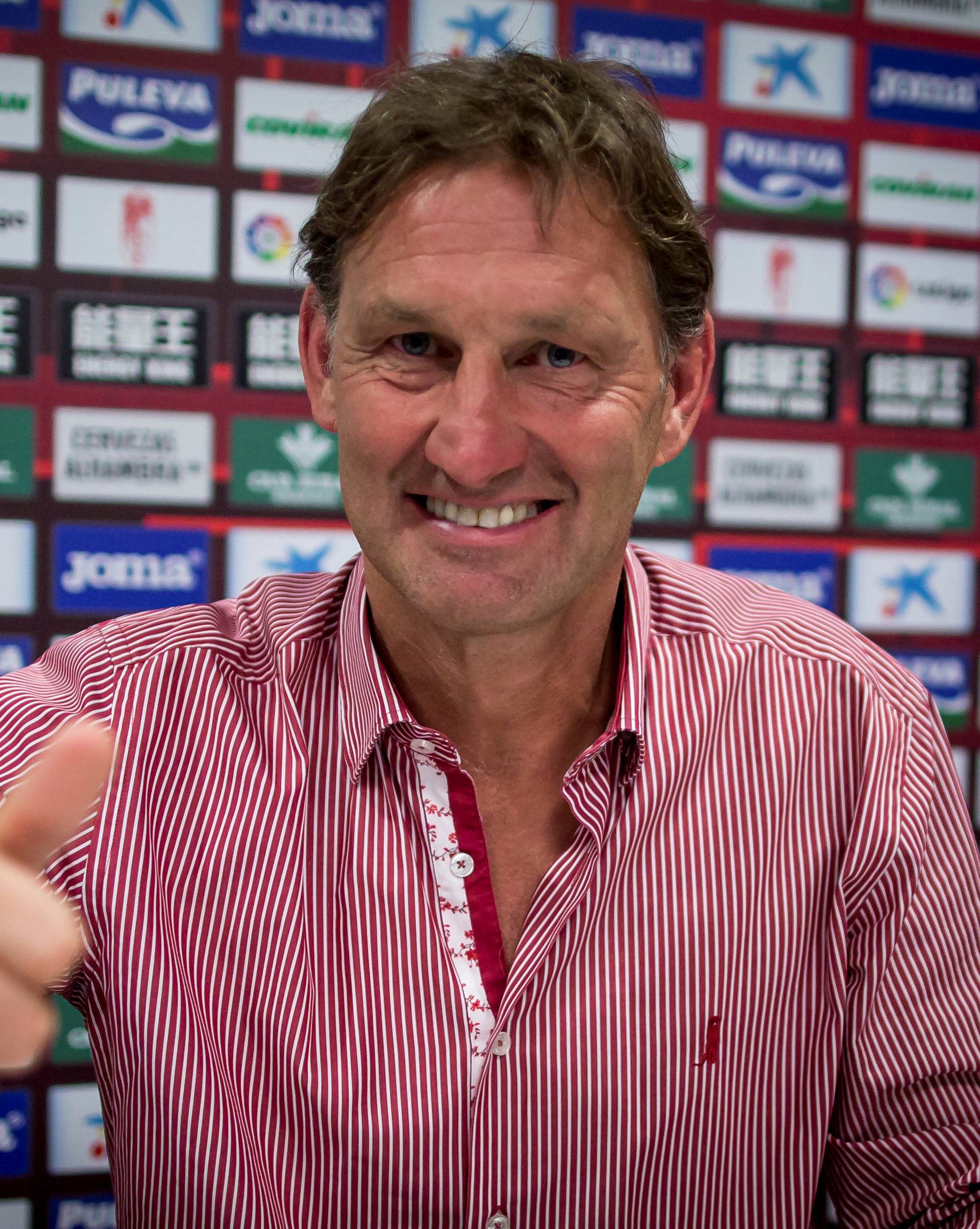 Former Arsenal and England captain Adams smiles after being presented as new head coach of Granada soccer club in Granada