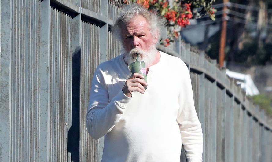 *EXCLUSIVE* Nick Nolte climbs a fence in his PJ's in Malibu