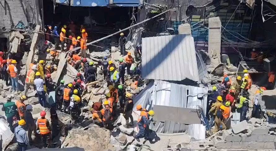 Rescuers work at the site of the collapsed Jet Set nightclub in Santo Domingo
