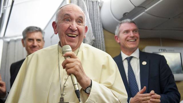 Pope Francis On Plane Back From Canada