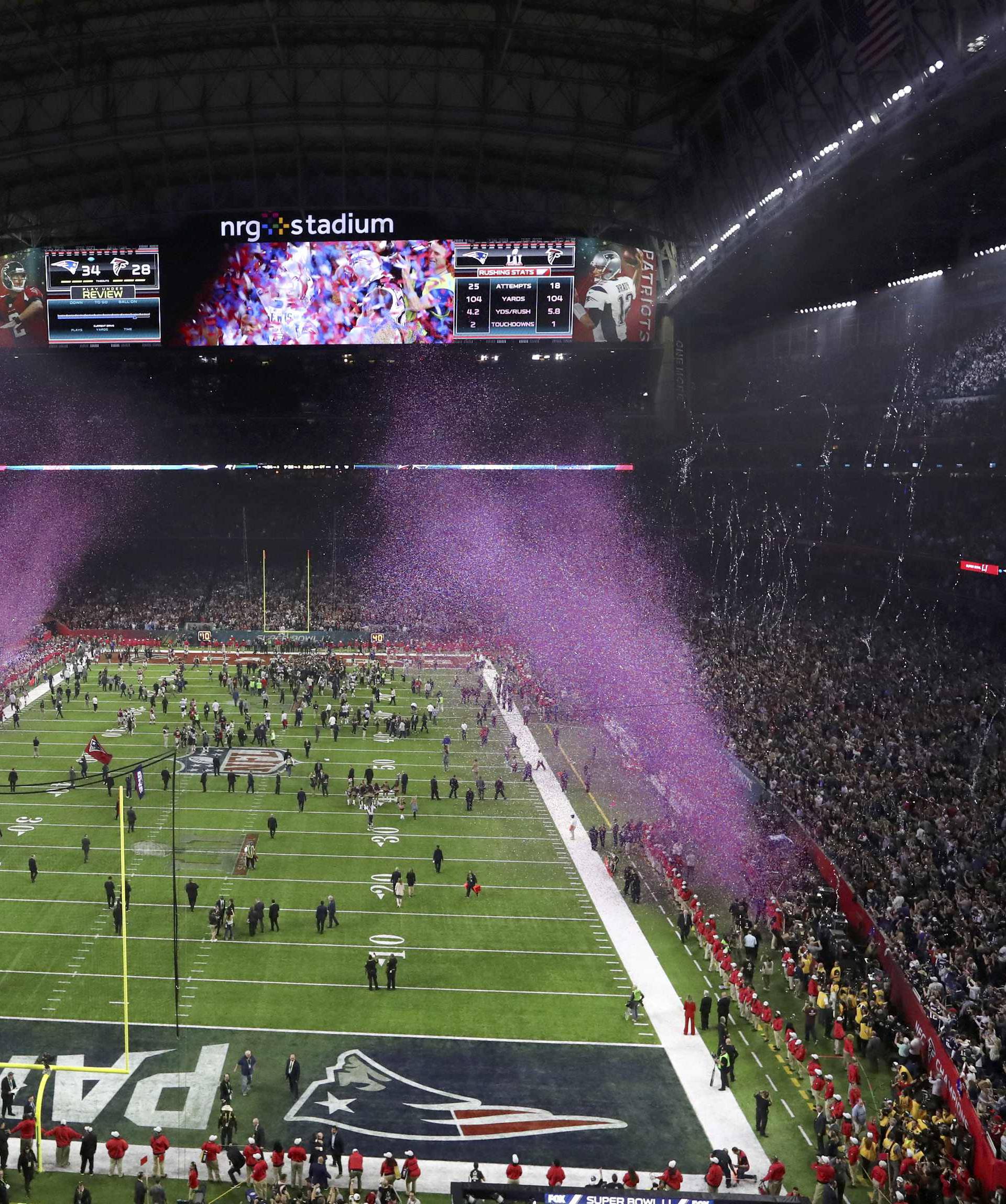 Overall view of the field as confetti sprays into the air after the New England Patriots defeated the Atlanta Falcons to win Super Bowl LI in Houston