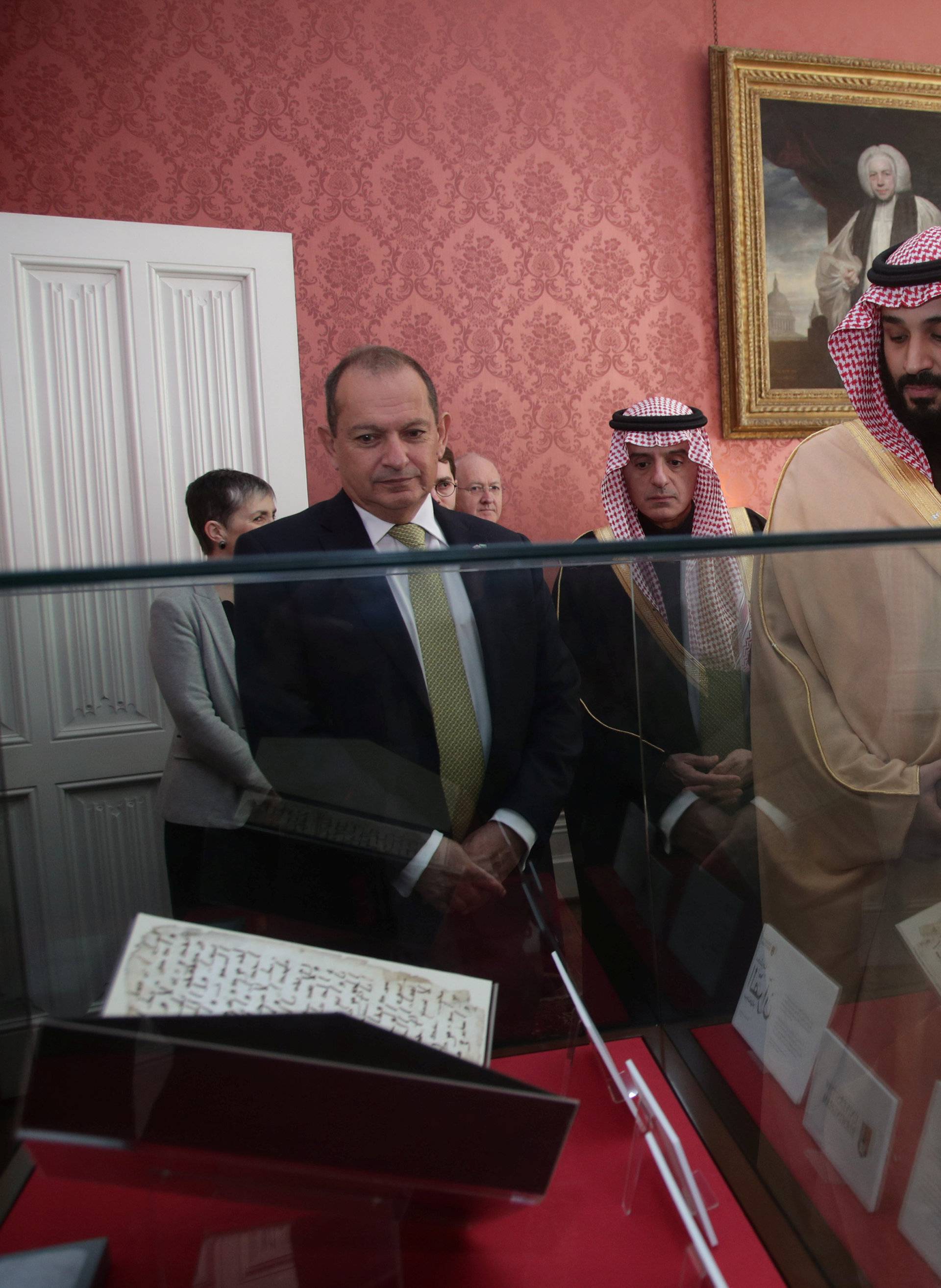 Britain's Archbishop of Canterbury Justin Welby shows The Crown Prince of Saudi Arabia Mohammed bin Salman the Birmingham Koran manuscript during a private meeting at Lambeth Palace, London