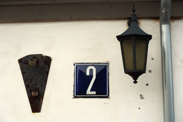 Number on the wall of the old house.