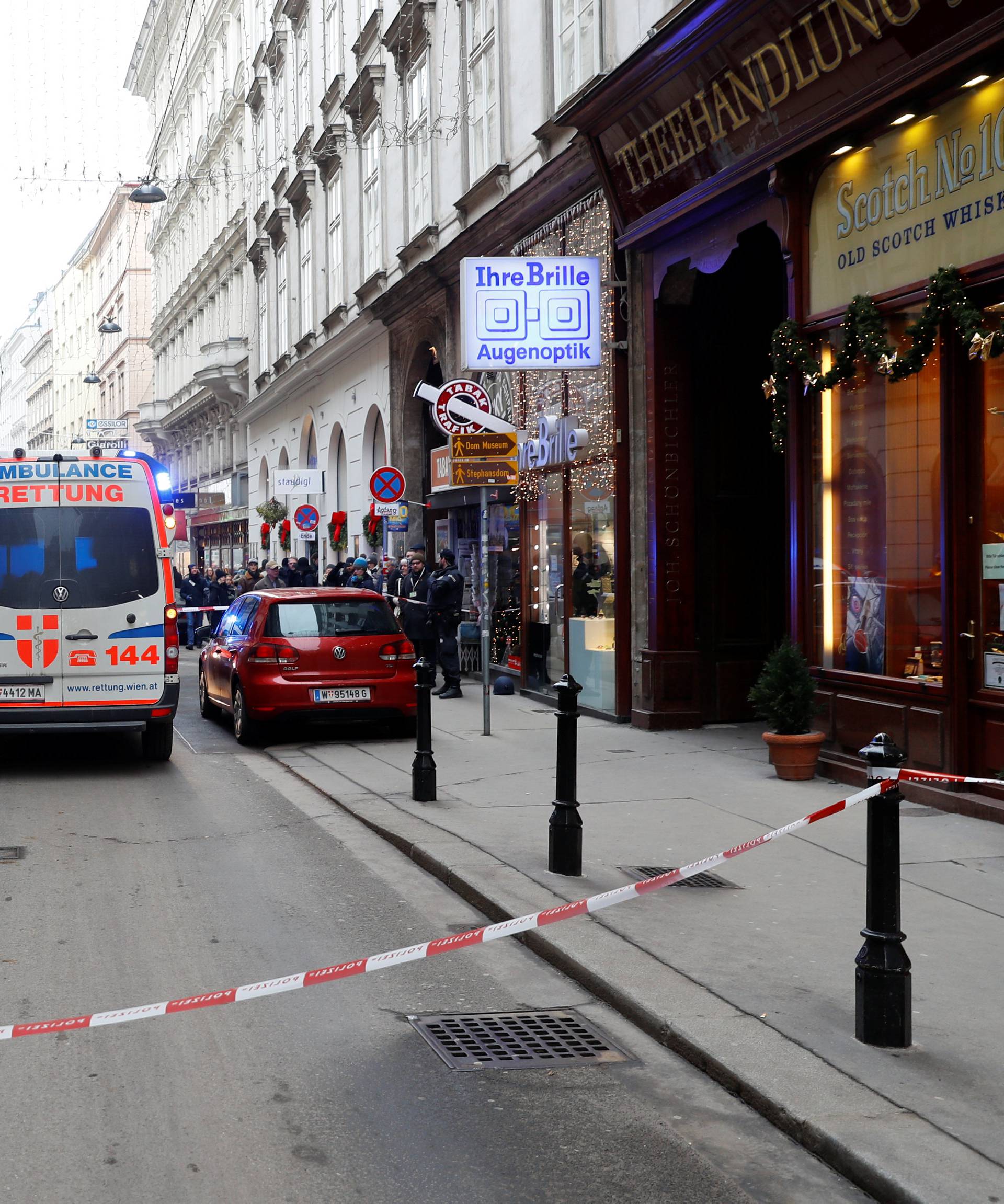 Police secure the area after shots were fired in a restaurant in Vienna