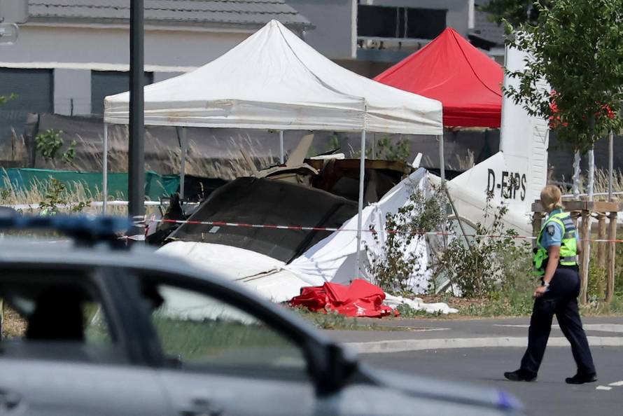 French rescuers work at the site of a plane crash, in Tomblaine