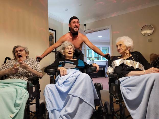 Tea and beef-cake! OAP gets Butler in the Buff for her 103rd birthday at care home