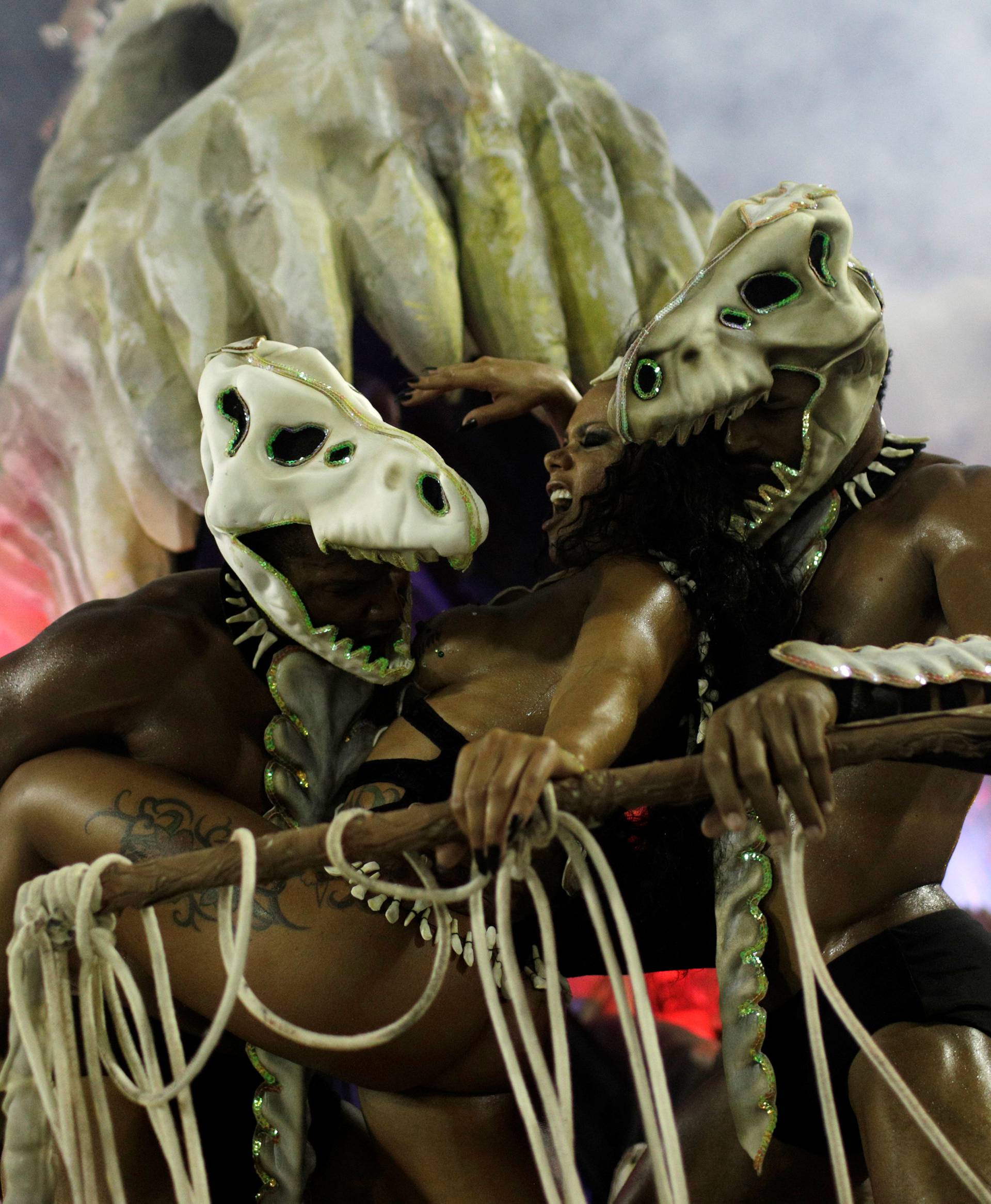 Revellers from Imperatriz samba school perform during the second night of the Carnival parade at the Sambadrome in Rio de Janeiro