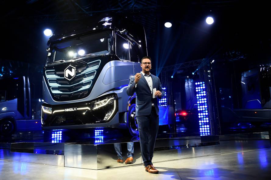 FILE PHOTO: CEO and founder of U.S. Nikola Trevor Milton speaks during presentation of its new full-electric and hydrogen fuel-cell battery trucks in partnership with CNH Industrial, at an event in Turin