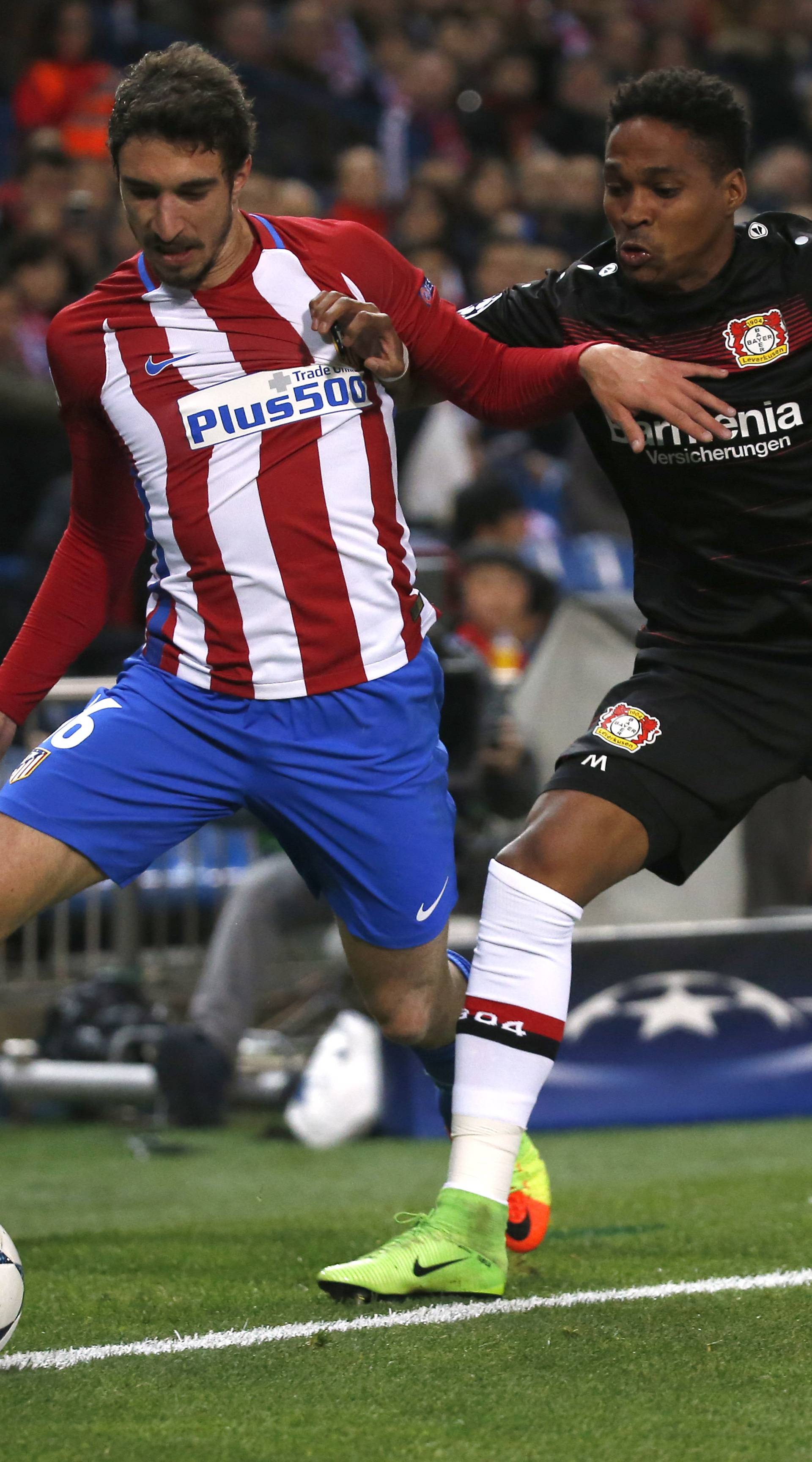 Atletico Madrid's Sime Vrsaljko in action with Bayer Leverkusen's Wendell