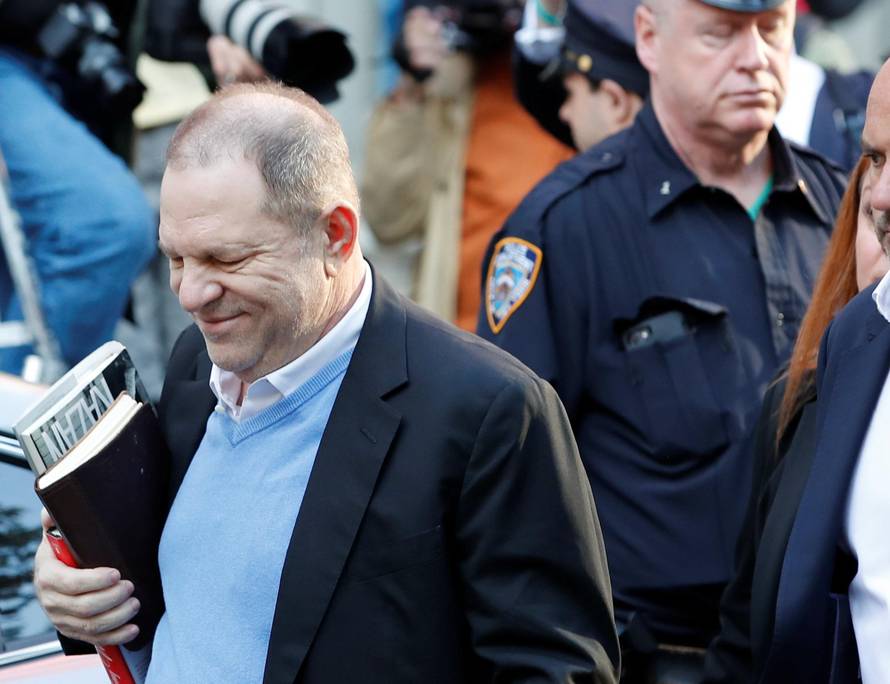 Film producer Harvey Weinstein arrives at the 1st Precinct in Manhattan in New York