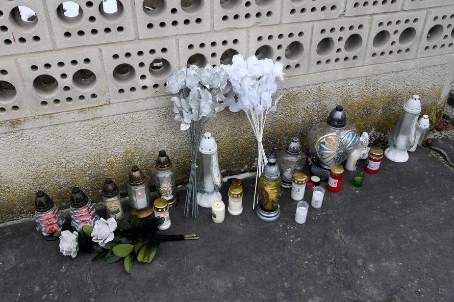 Candles and flowers are seen near to the house where Slovak investigative journalist Jan Kuciak and his girlfriend Martina Kusnirova lived and were murdered in the village of Velka Maca