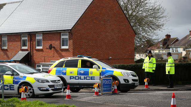 FILE PHOTO: Police officers guard the cordoned off area around the home of former Russian intelligence officer Sergei Skripal in Salisbury