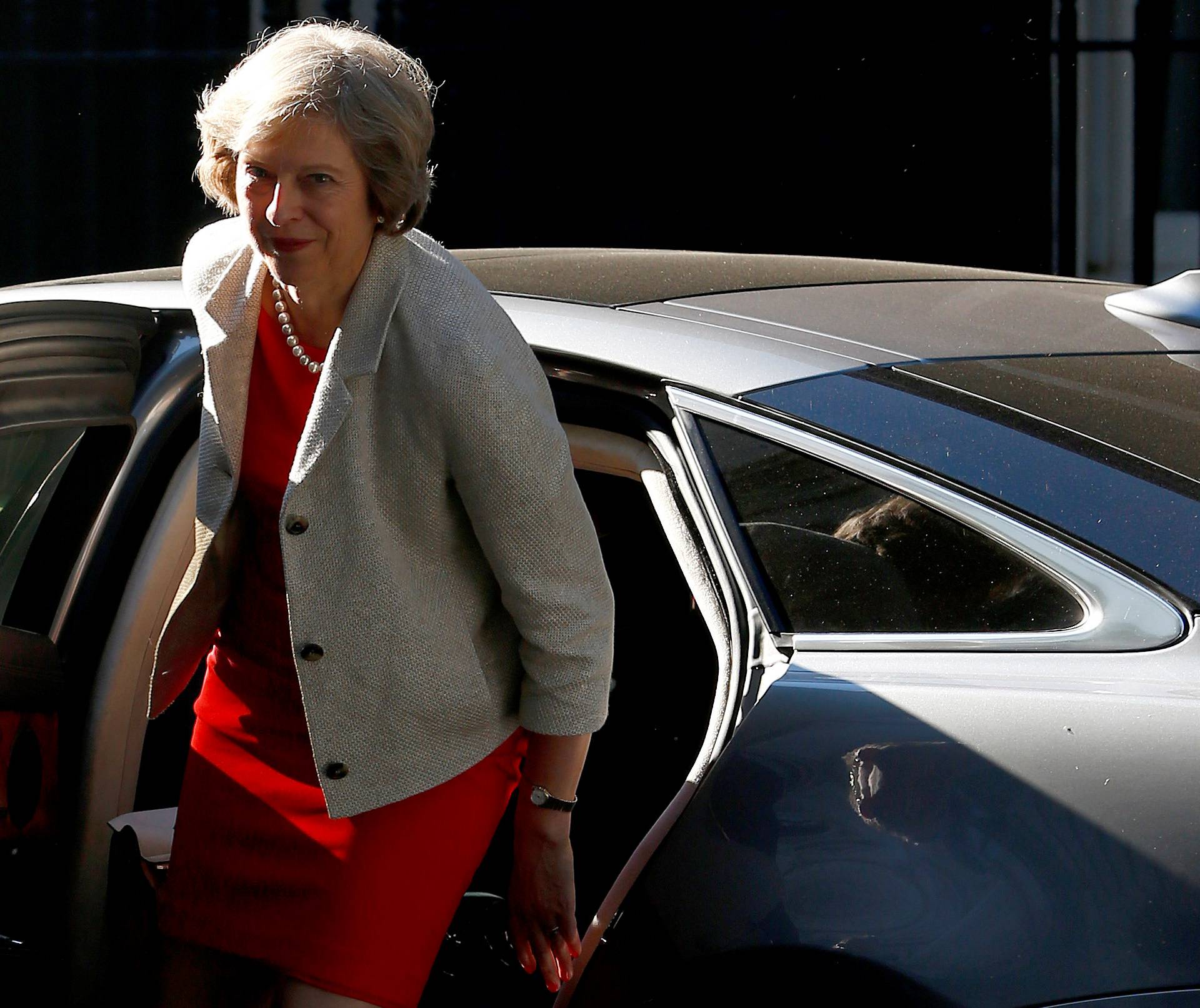 Britain's Prime Minister Theresa May arrives at Downing Street in London