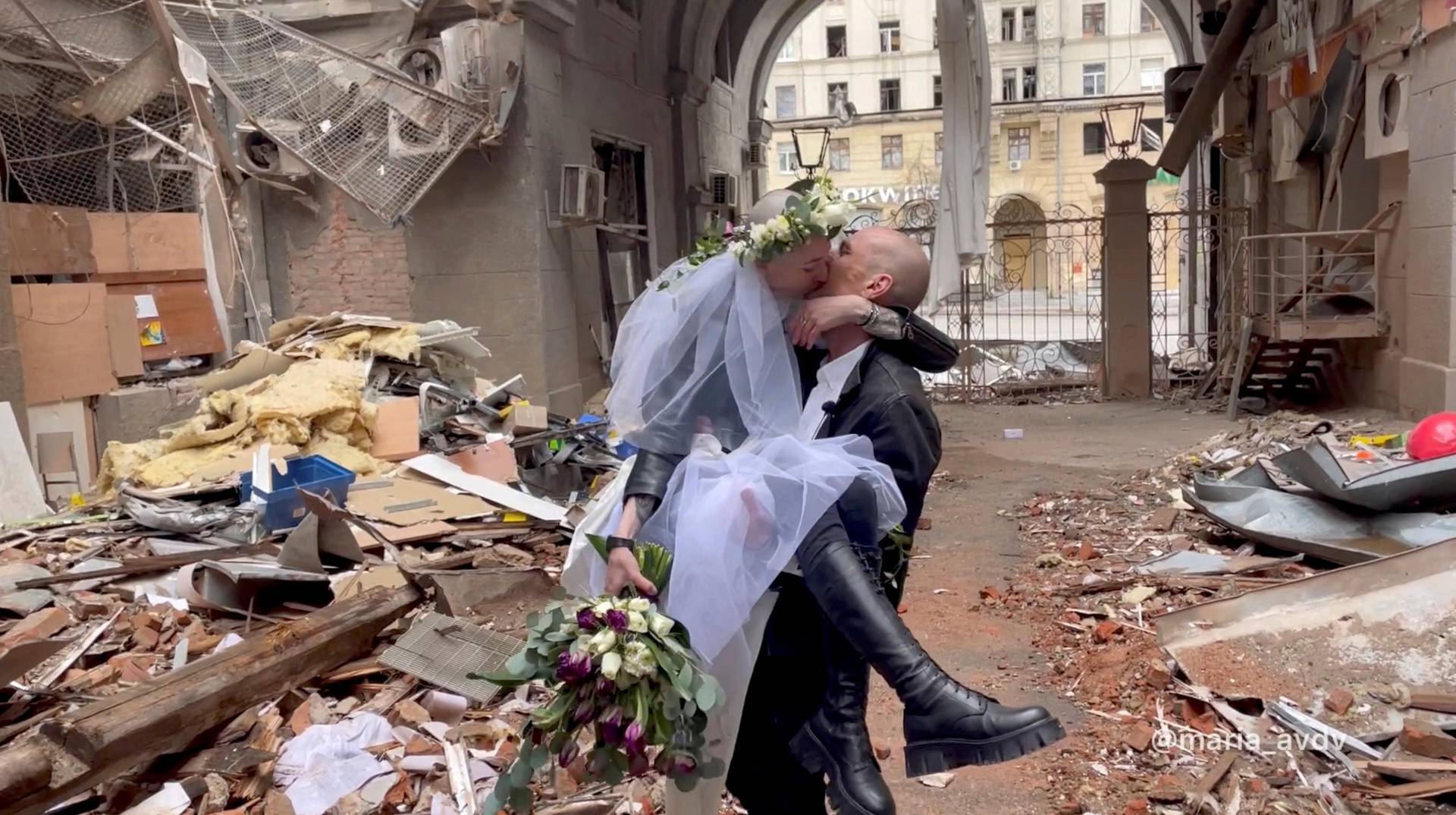 Ukrainian bride and groom, amid Russia's invasion of Ukraine, in Kharkiv