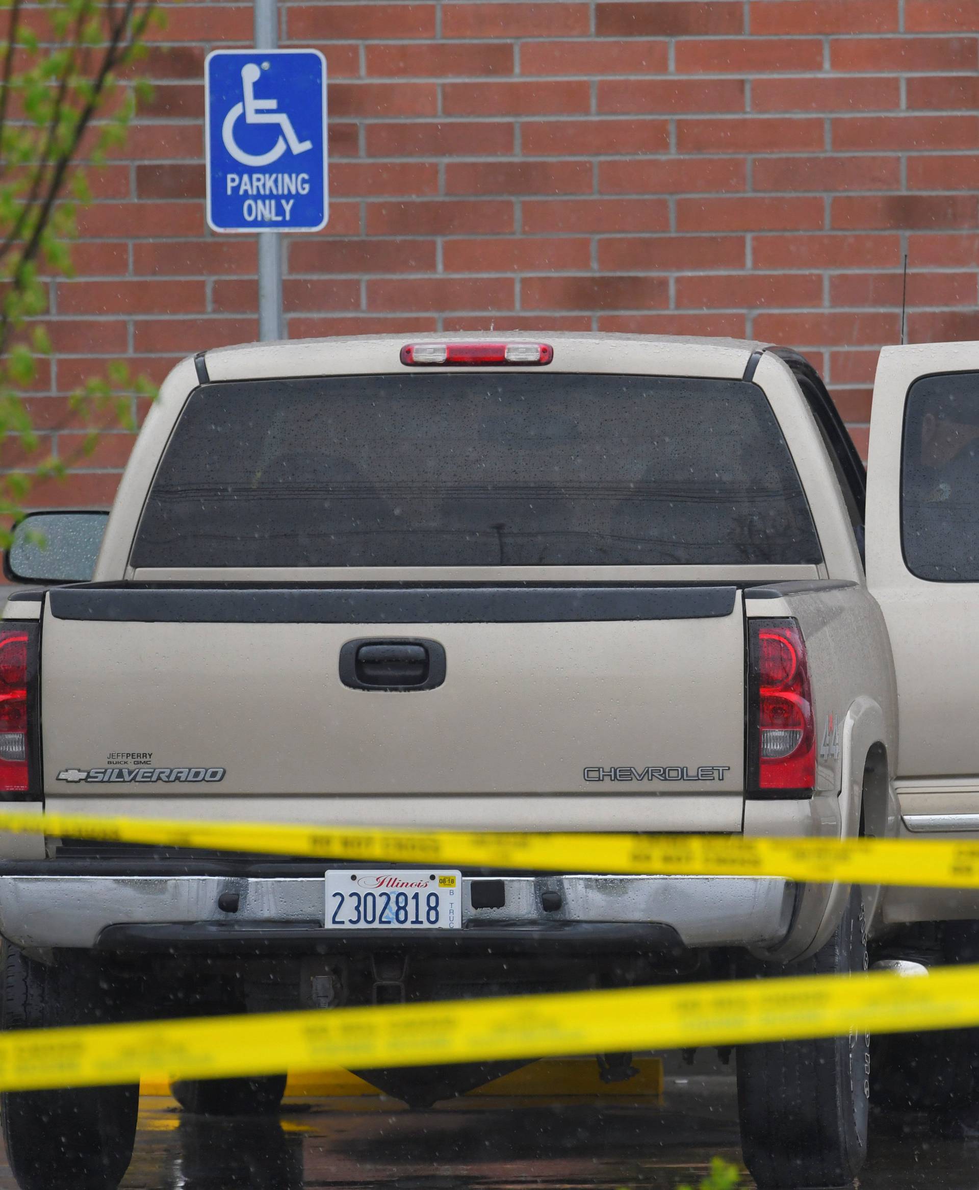 Metro Davidson County Police inspect the truck of Travis Reinking, the suspected shooter, at the scene of a fatal shooting at a Waffle House restaurant near Nashville, Tennessee