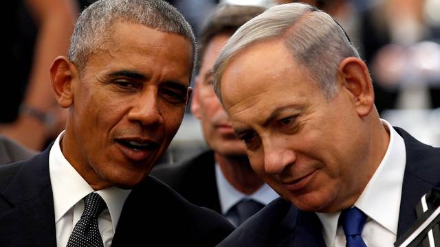 FILE PHOTO: U.S. President Barack Obama speaks to Israeli PM Netanyahu during burial ceremony of former Israeli President Peres at Mount Herzl Cemetery in Jerusalem