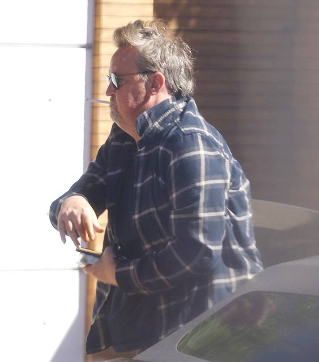 Exclusive - Matthew Perry Puffs on a Cigarette as he Steps out in Los Feliz, Los Angeles, California, USA - 28 Oct 2021