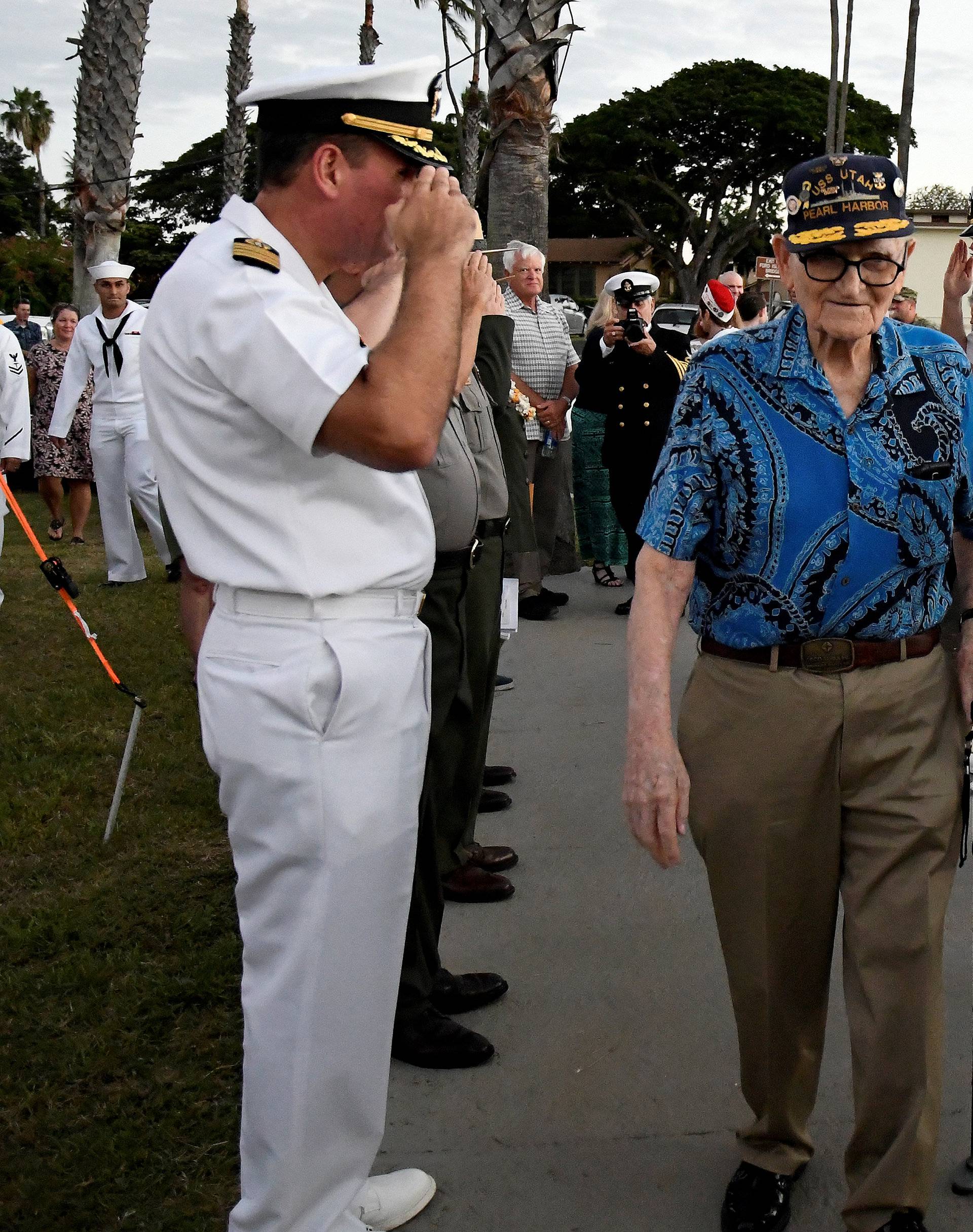 Pearl Harbor survivor Bill Hughes, who was aboard the USS Utah when it was attacked, arrives at a ceremony honoring the sailors of the USS Utah at the memorial on Ford Island at Pearl Harbor in Honolulu, Hawaii