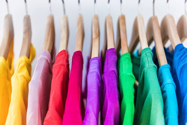 Fashion,Clothes,On,Clothing,Rack,-,Bright,Colorful,Closet.,Closeup