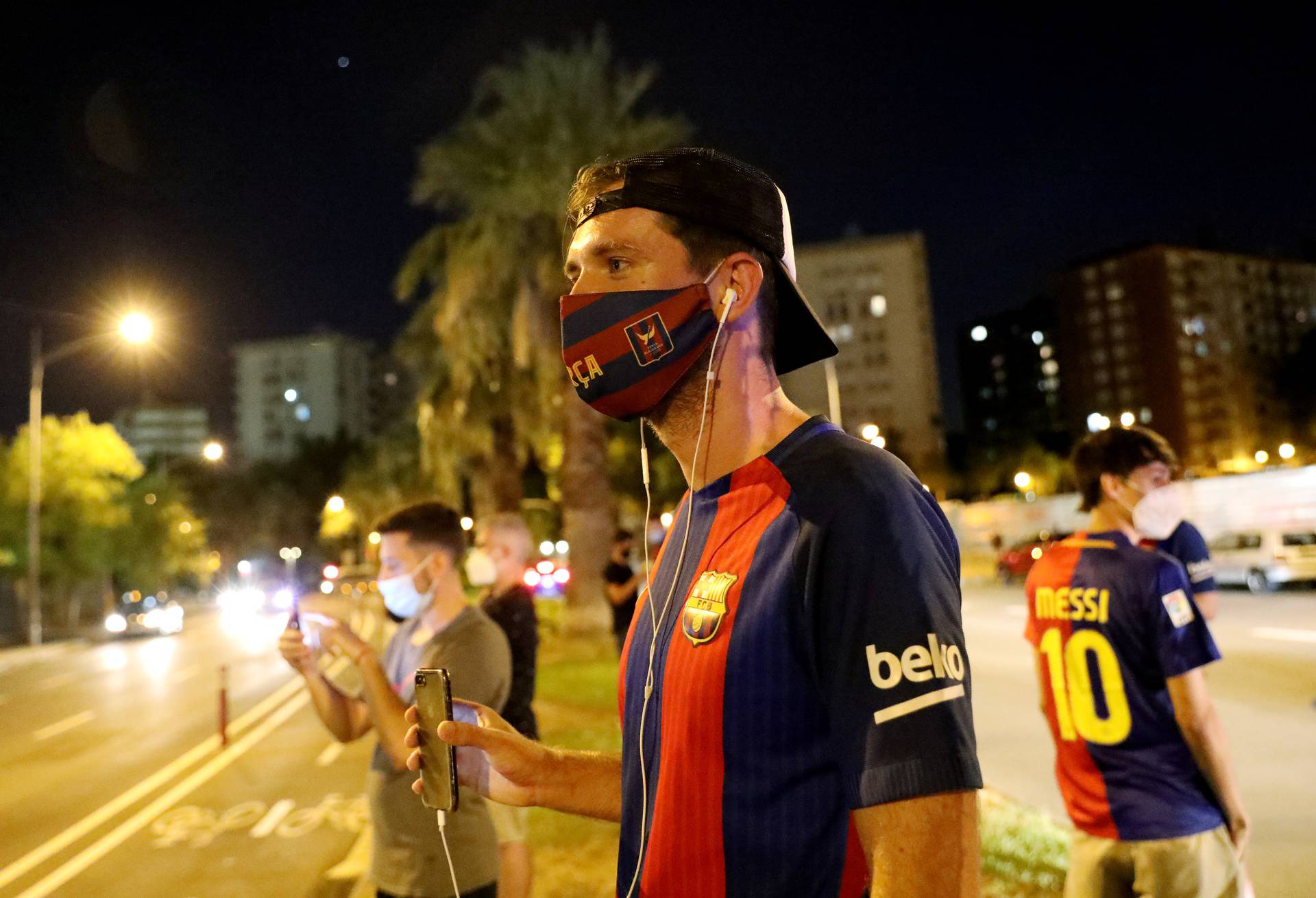 Barcelona fans are seen outside the Camp Nou after captain Lionel Messi told Barcelona he wishes to leave the club immediately