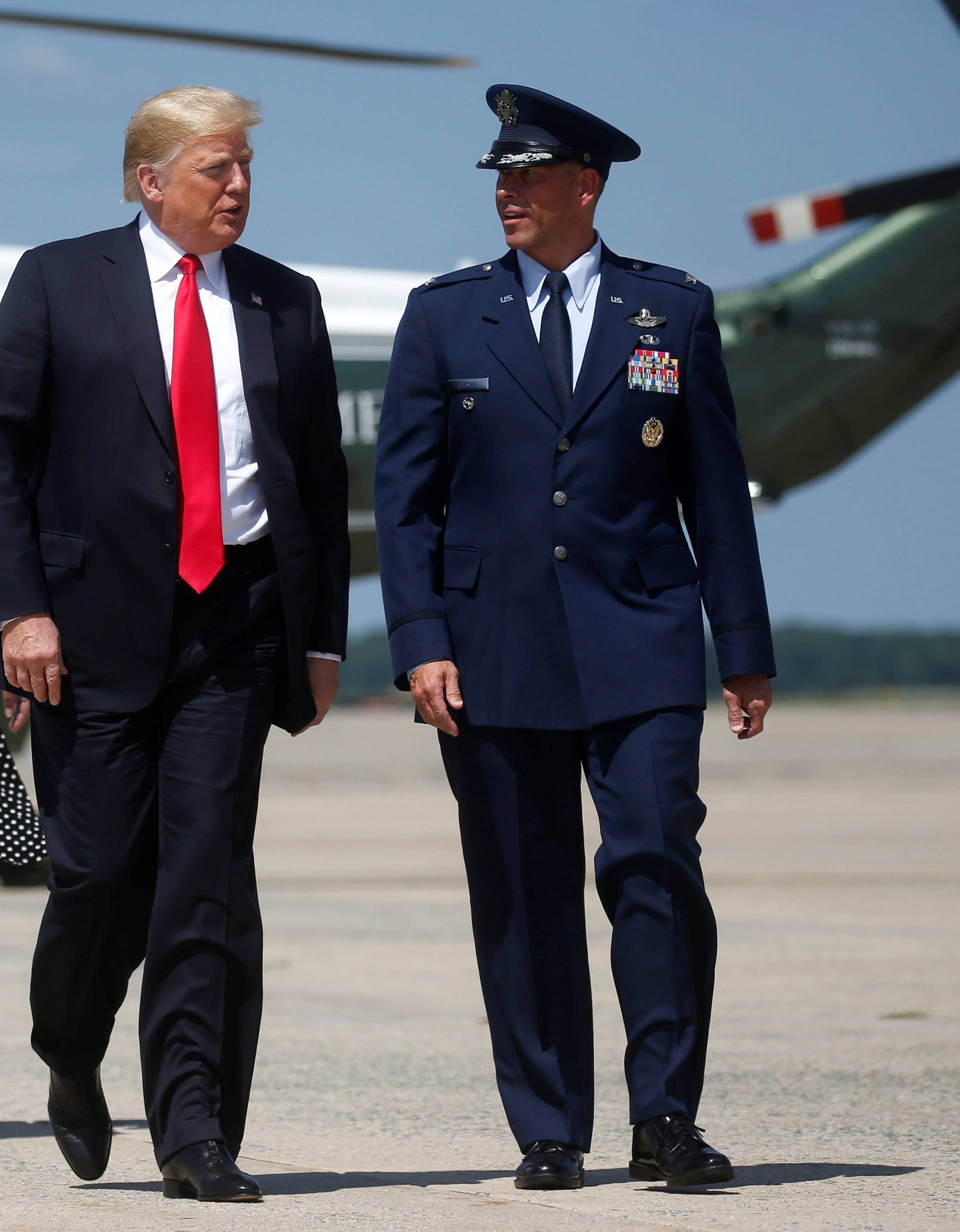 U.S. President Donald Trump boards Air Force One to depart for travel to Ohio from Joint Base Andrews in Maryland, U.S.