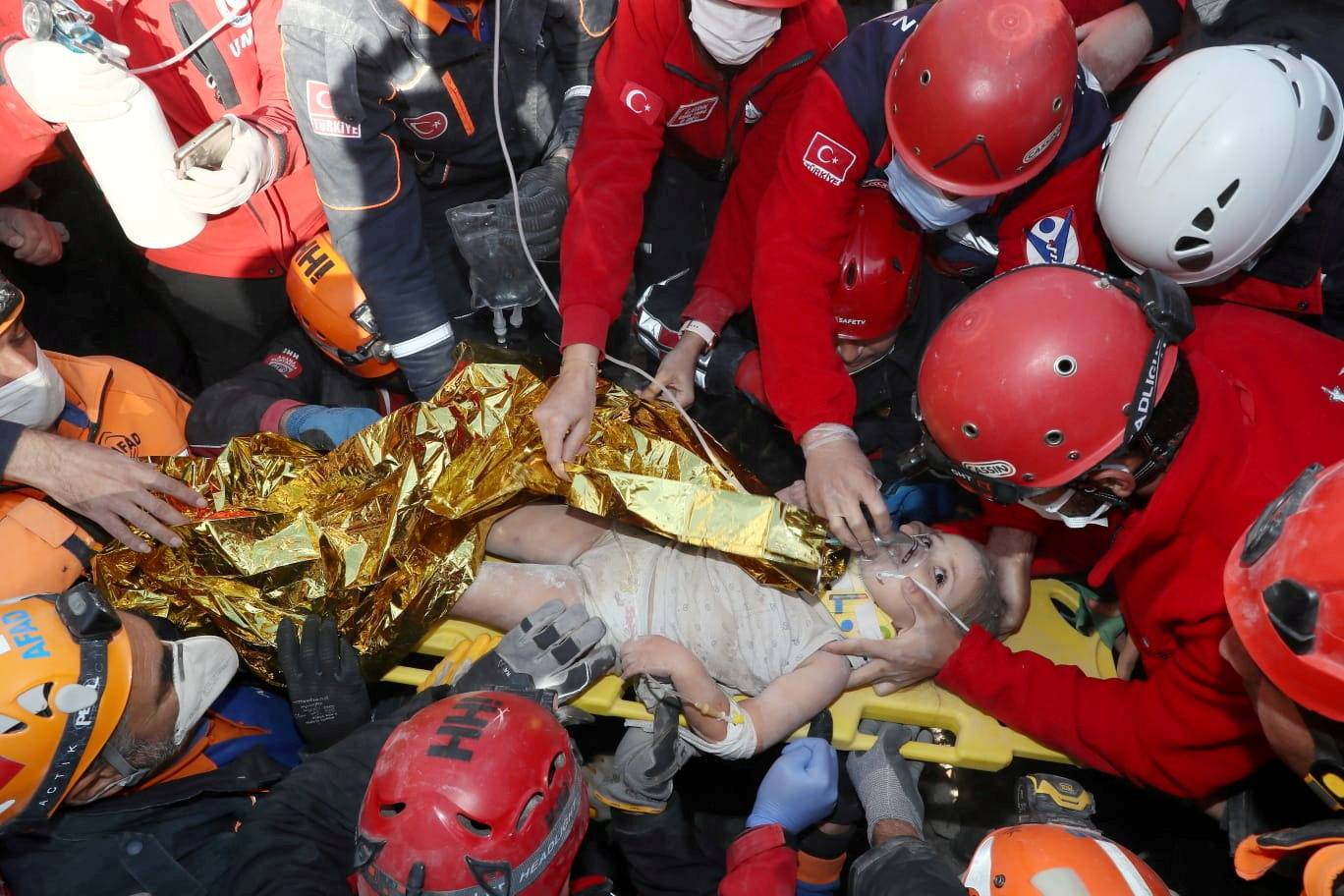 Rescue workers search for earthquake survivors in Izmir