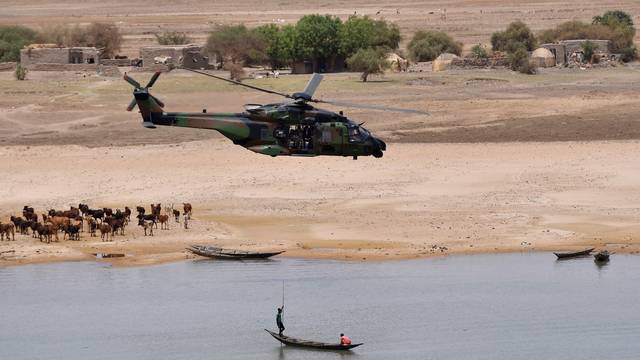 FILE PHOTO: French President Emmanuel Macron visits French troops in Africa's Sahel region in Mali