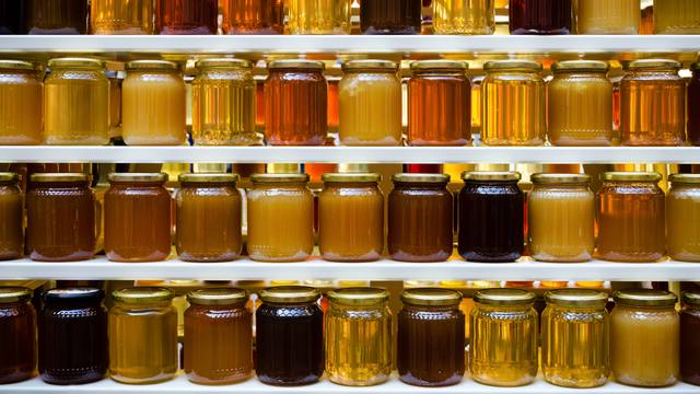 Jars,Of,Different,Honey,Varieties,Stocked,On,A,Shelf