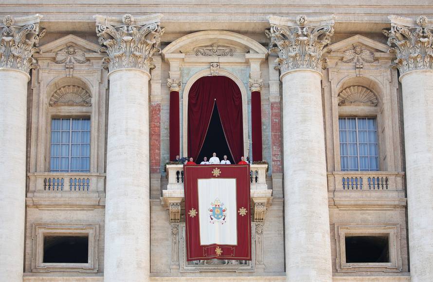Pope Francis leads the "Urbi et Orbi" message from the balcony overlooking St. Peter's Square at the Vatican