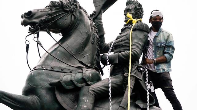 Protestors try to pull down statue of U.S. President Andrew Jackson in front of the White House in Washington