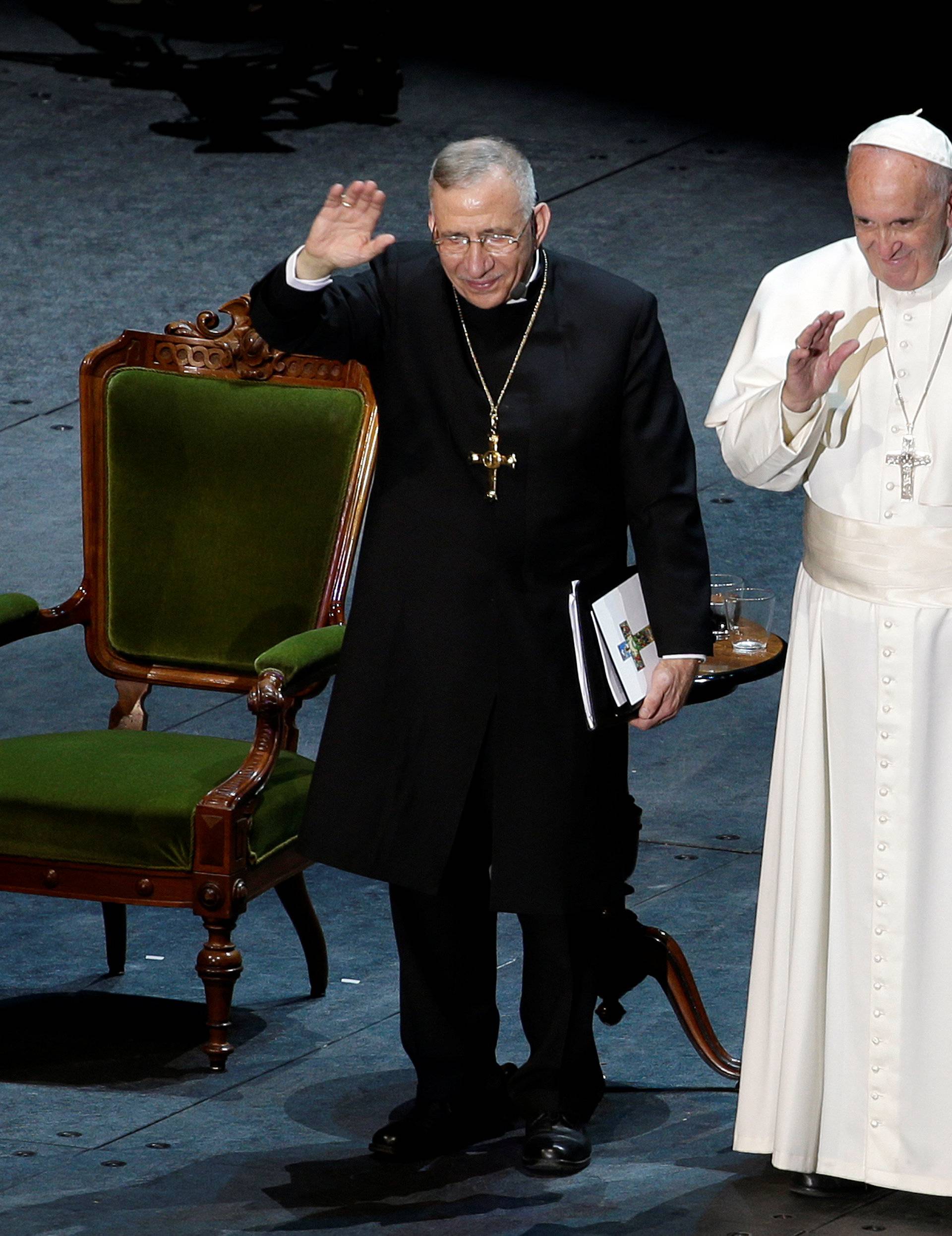 Pope Francis waves with General Secretary of the Lutheran World Federation Rev. Jungeand President of the Lutheran World Federation Bishop Younan at the Malmo Arena in Malmo