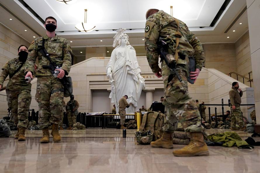 National Guard members gather at the U.S. Capitol in Washington