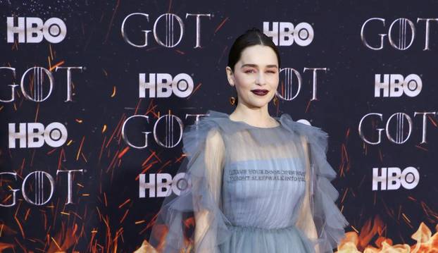 Emilia Clarke poses at the premiere of the final season of "Game of Thrones" at Radio City Music Hall in New York