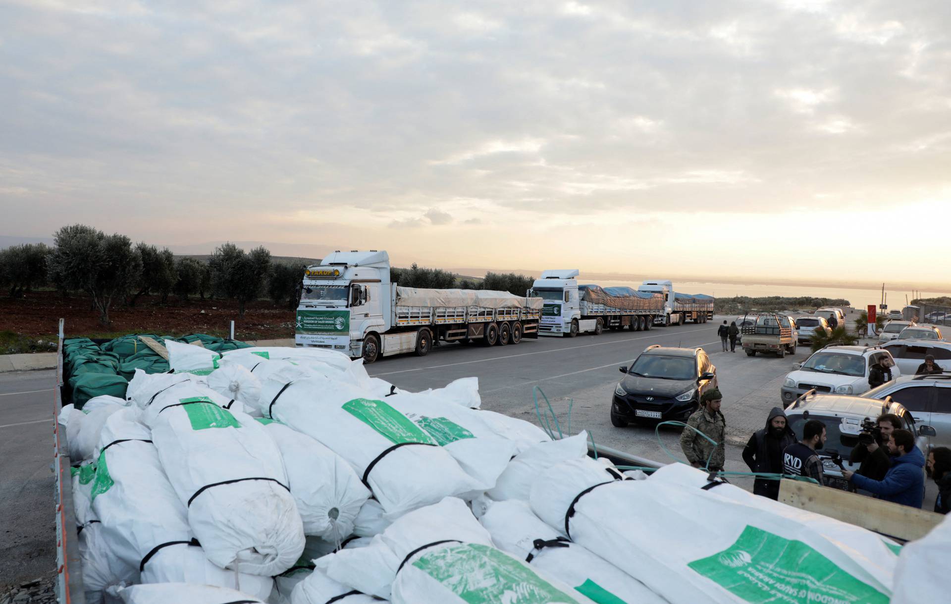 Aid trucks at the border crossing of al-Hamam in Afrin