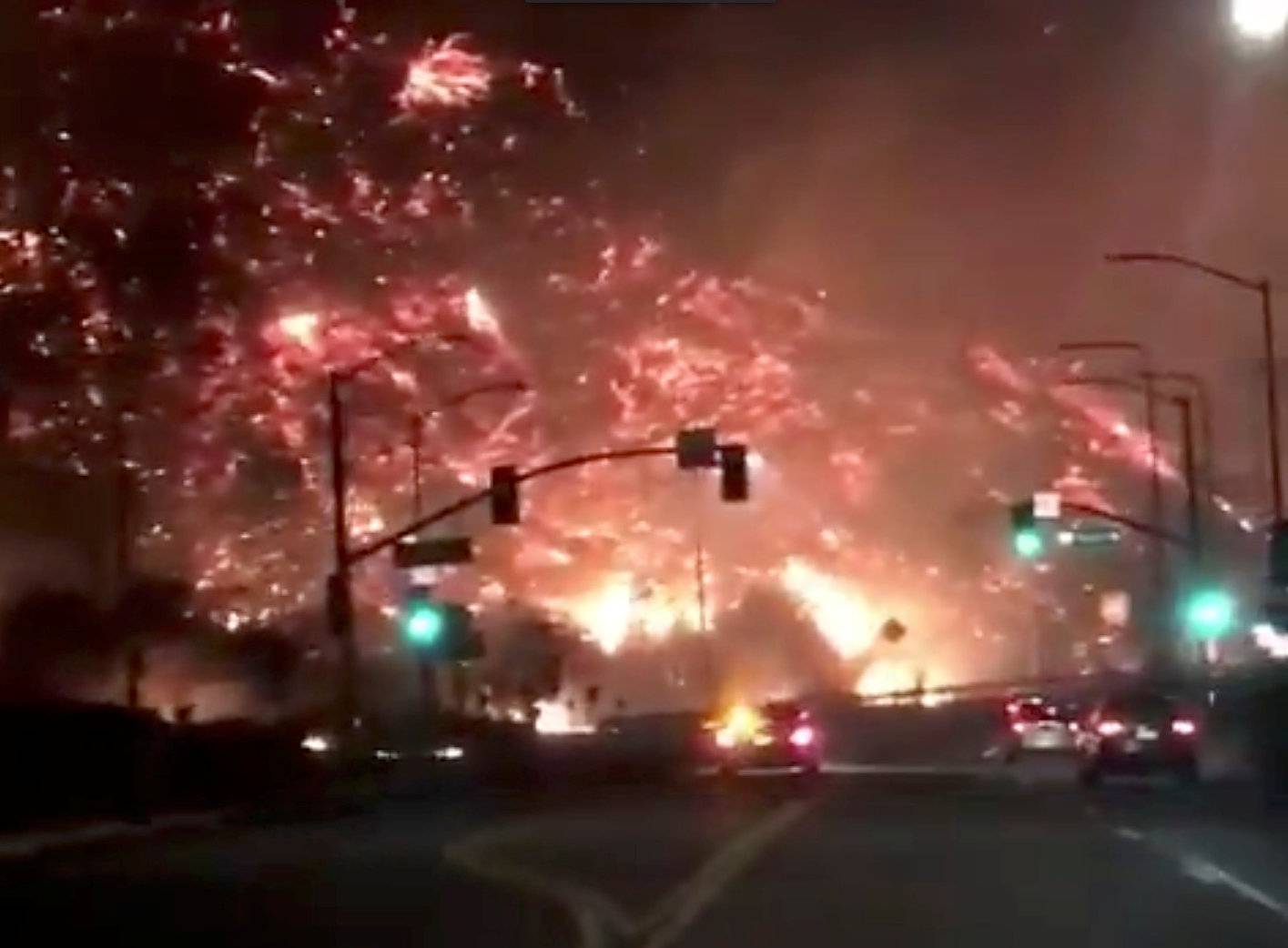 Flames of a wildfire in 405 highway in Los Angeles