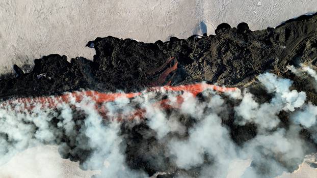 Italy's Mount Etna erupts