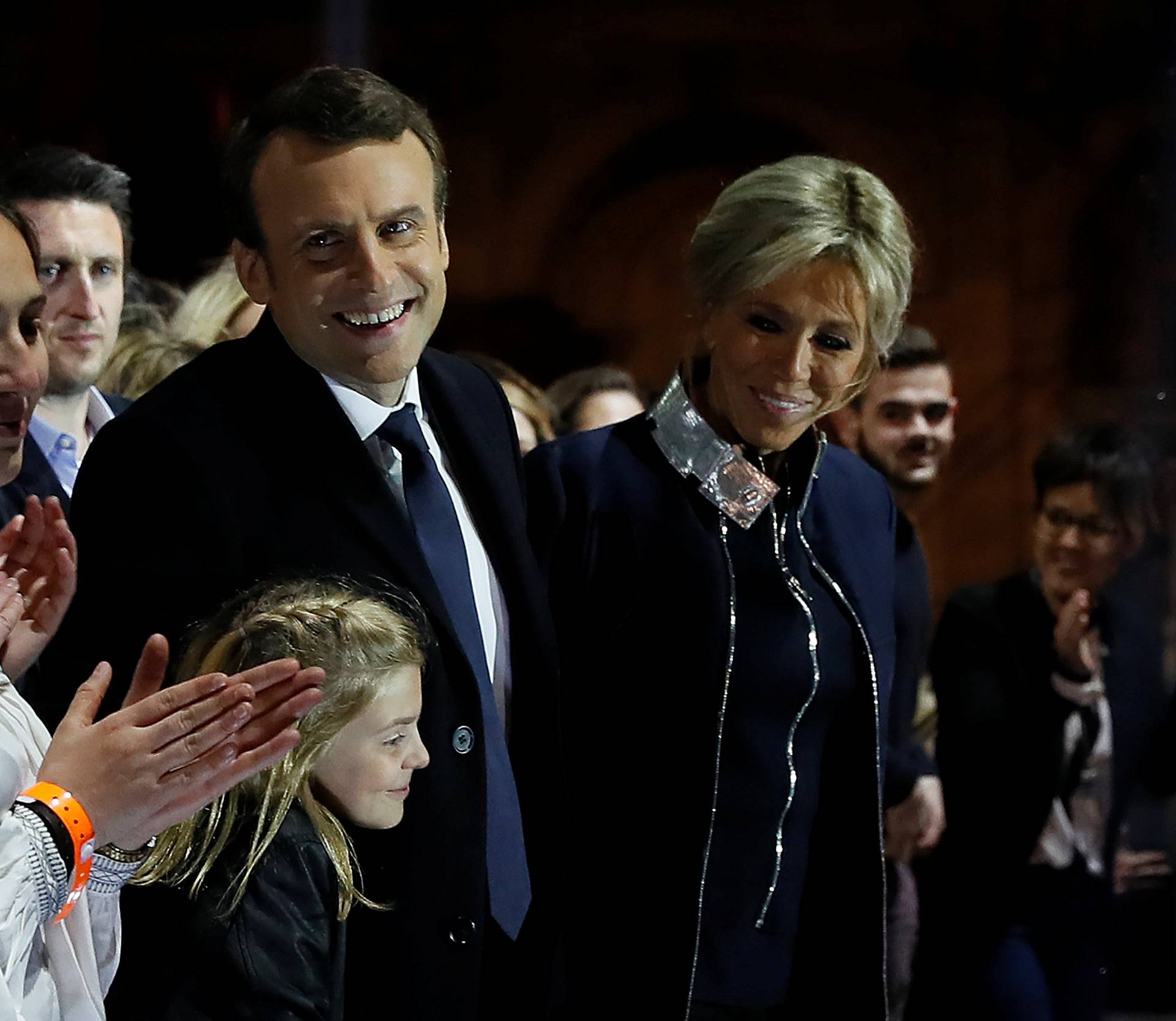 French President elect Emmanuel Macron celebrates on stage during his victory rally near the Louvre museum after results in the 2017 presidential election in Paris