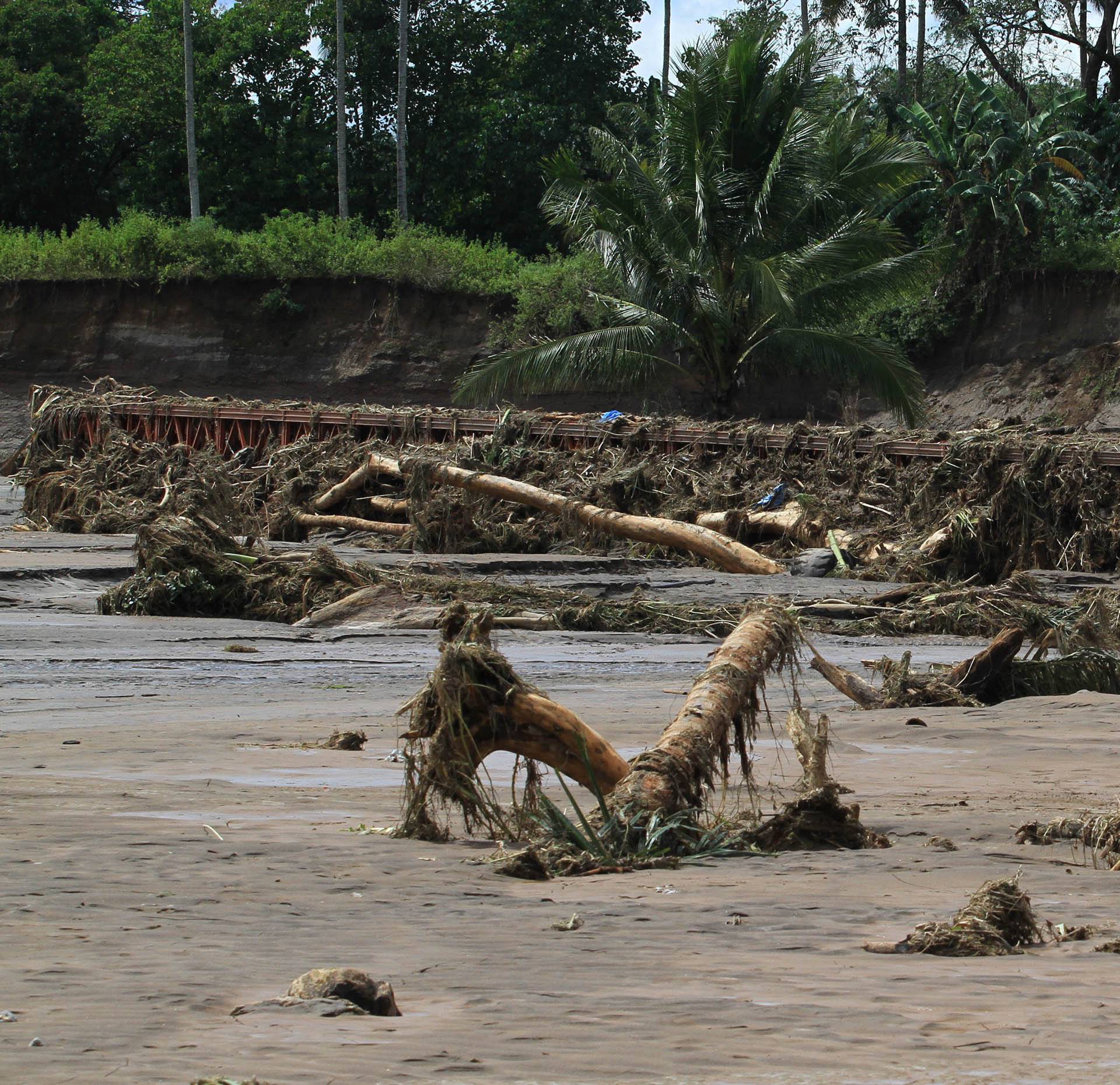 View of destroyed bridge after flash floods in Salvador, Lanao del Norte