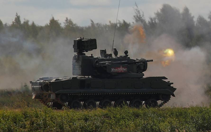 A Russian 2K22 Tunguska anti-aircraft vehicle fires during a demonstration at the annual international military-technical forum "ARMY" in Alabino