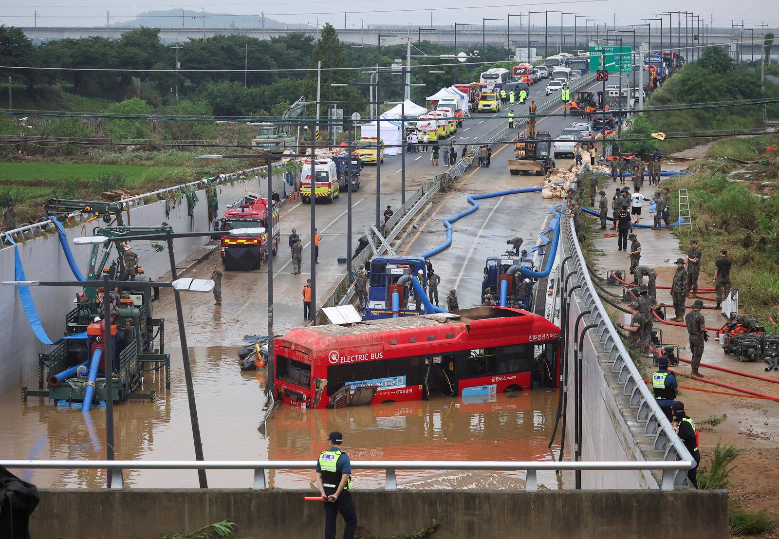 Search and rescue operation at an underpass that has been submerged by a flooded river caused by torrential rain in Cheongju